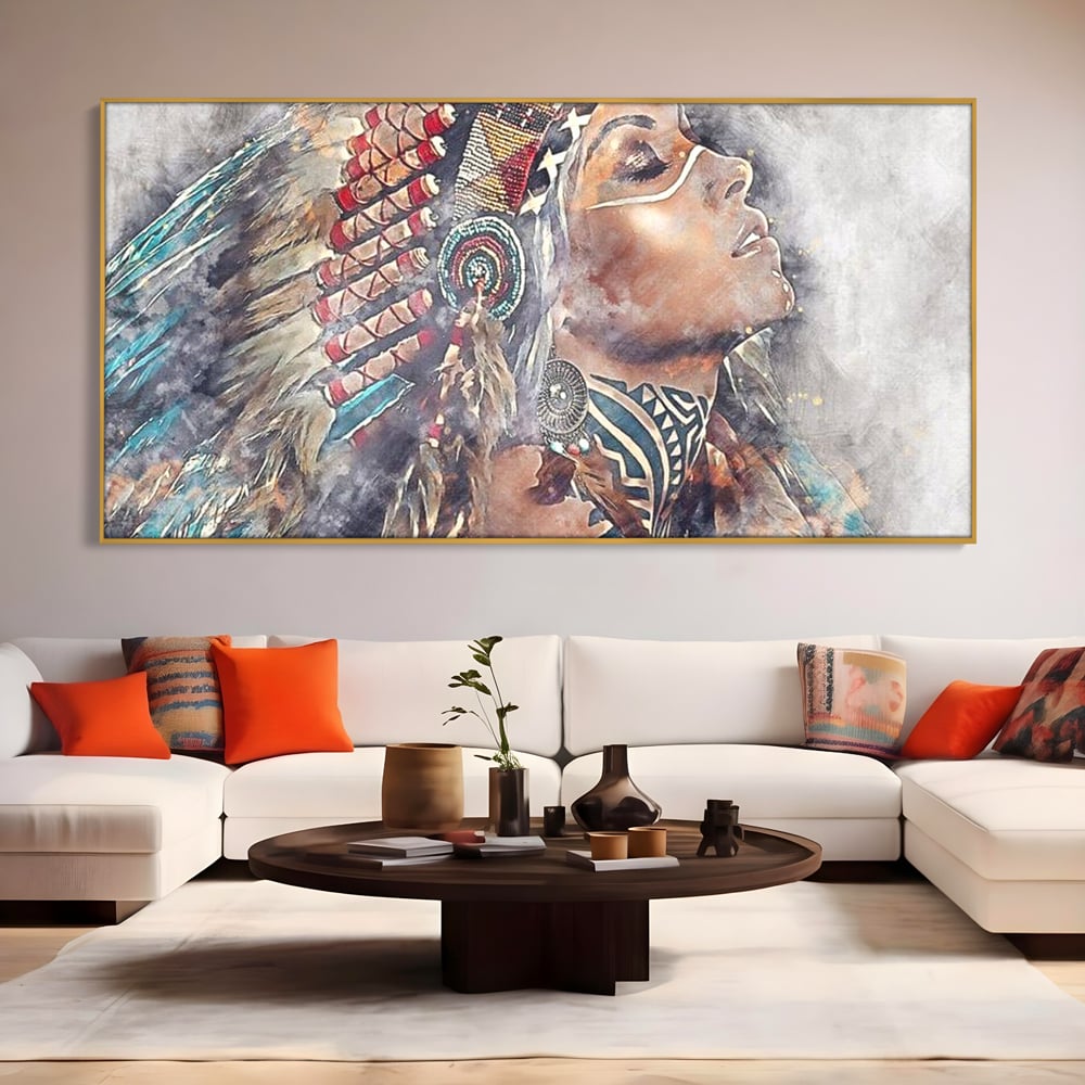 Tablou canvas cu tablou canvas cu femeie indigena, in rama de aluminiu auriu, pe perete intr-un living